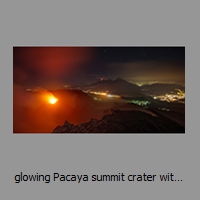 glowing Pacaya summit crater with Fuego and Agua volcanoes in the distance
